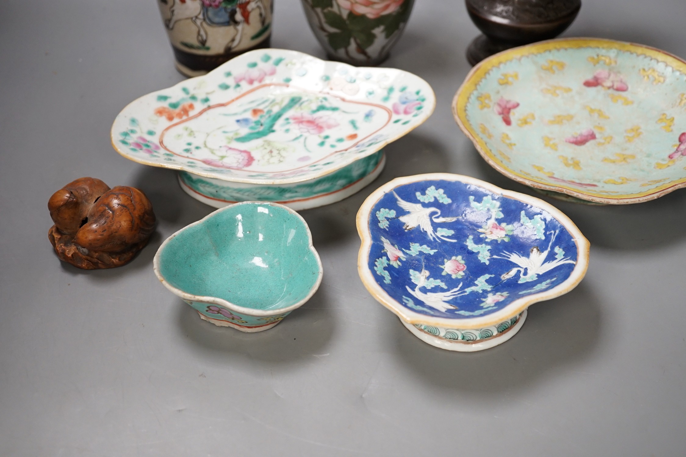 A group of 19th century Chinese porcelain dishes and a vase, and a Japanese ‘bird’ carving etc.
